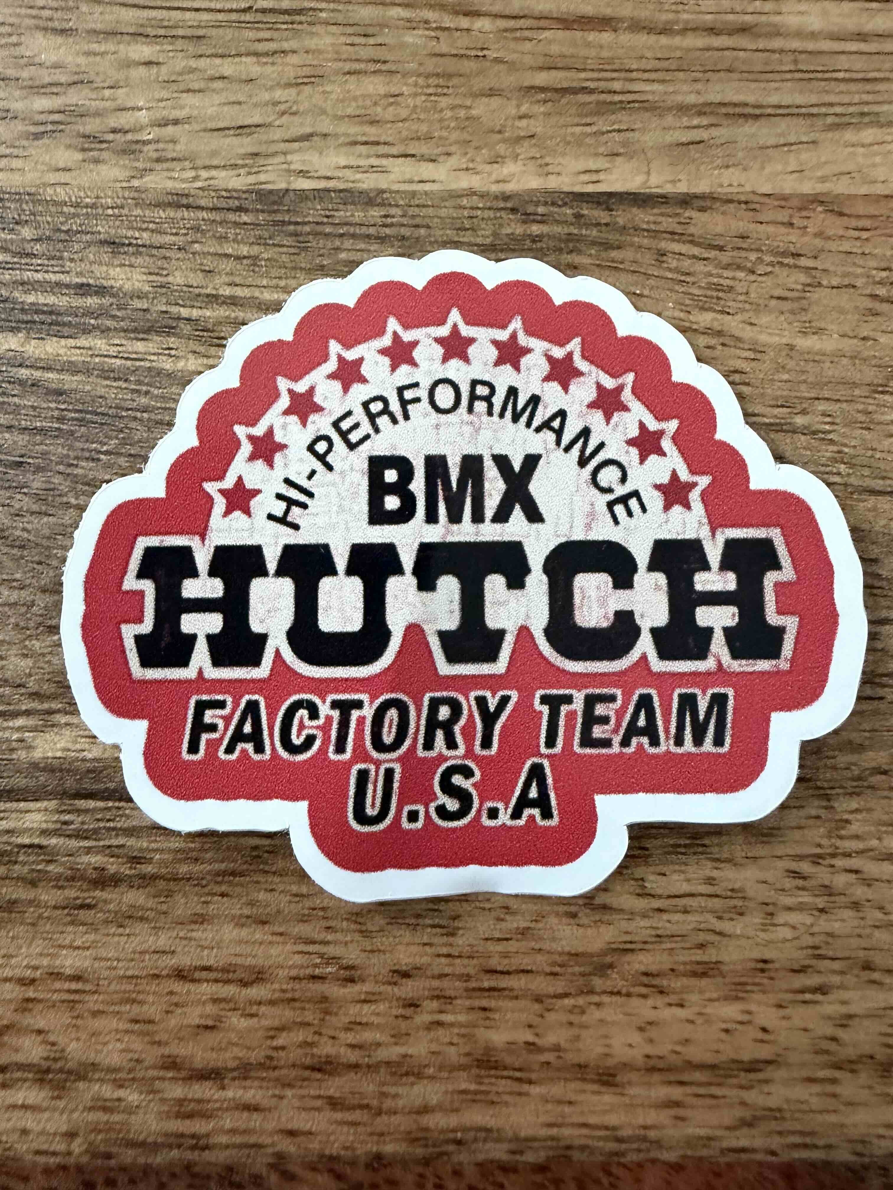 Hutch Stars logo in dirty red