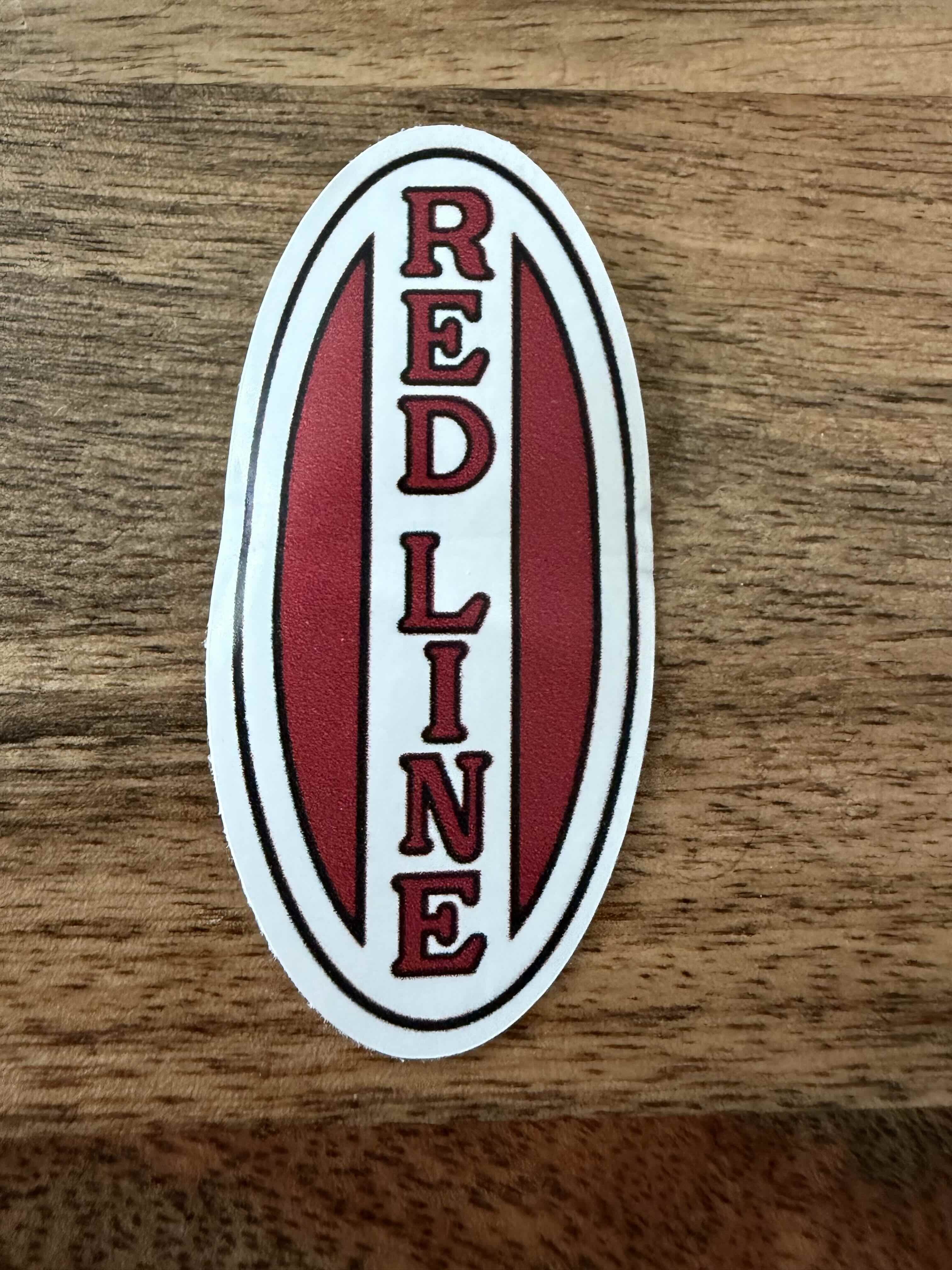 Redline vertical logo in red